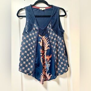 Taylor and Sage women’s Elegant Navy Sleeveless Top with Intricate Design
